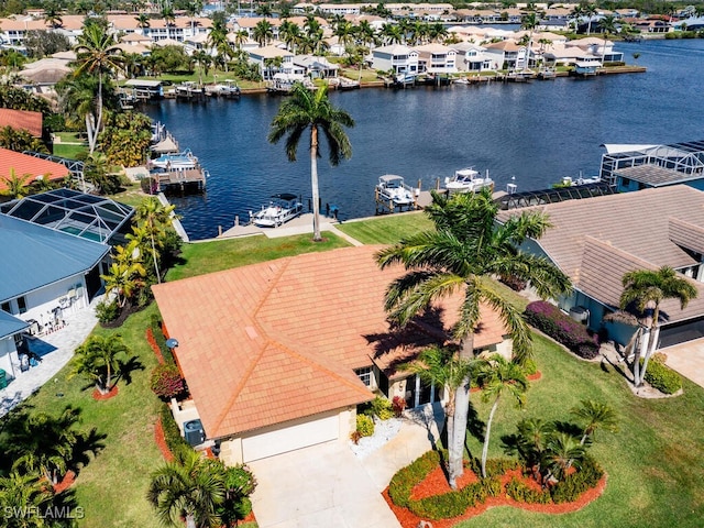 aerial view featuring a water view and a residential view