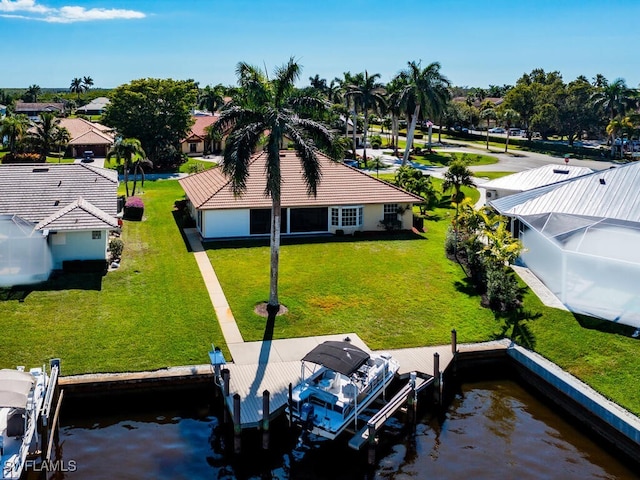 bird's eye view with a water view and a residential view