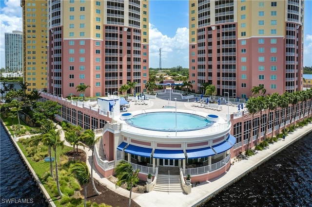 view of building exterior with a water view