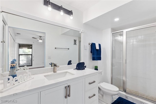 bathroom featuring visible vents, a ceiling fan, toilet, vanity, and a shower stall