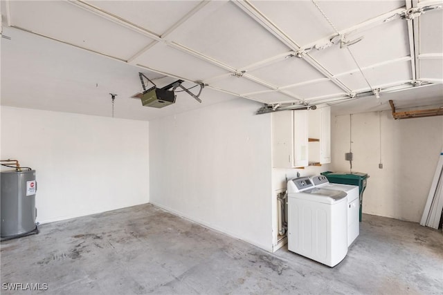 garage with a garage door opener, washing machine and dryer, and water heater