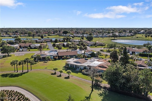 birds eye view of property featuring a water view, a residential view, and golf course view