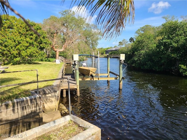 27253 Rio Vista Cir, Bonita Springs, FL 34135 - view of dock with a lawn, a water view, and boat lift