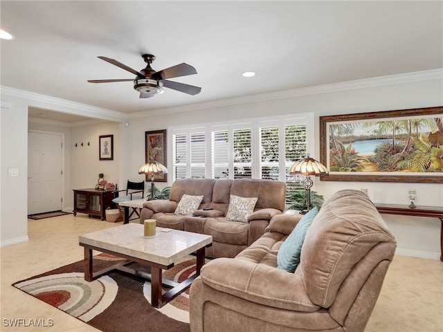 living area with baseboards, ceiling fan, recessed lighting, and crown molding