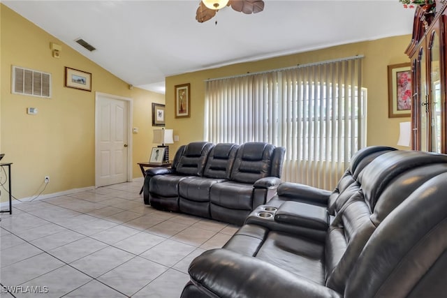 living room with light tile patterned floors, visible vents, vaulted ceiling, and a ceiling fan