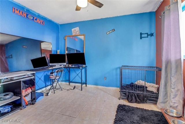 office space featuring light tile patterned floors and a ceiling fan