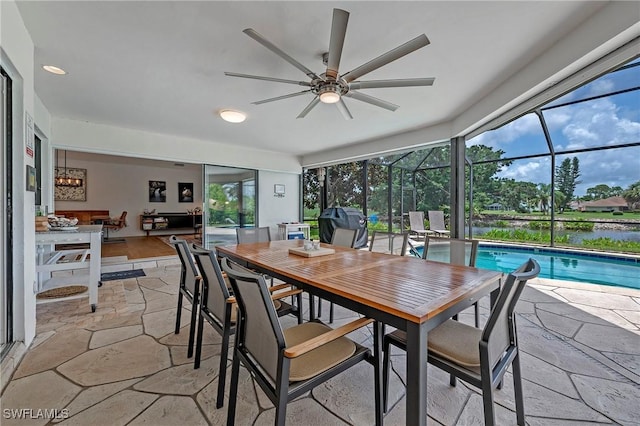 interior space with ceiling fan