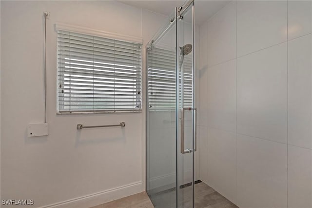 bathroom with a shower stall