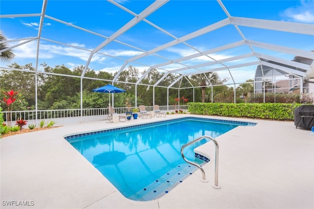 view of pool featuring a fenced in pool, a lanai, and a patio area