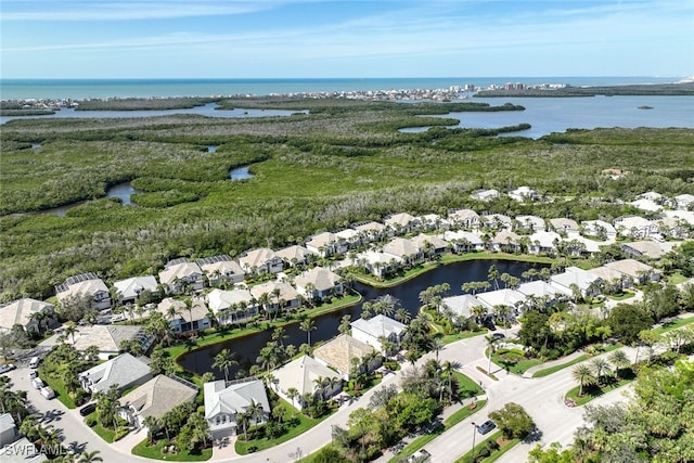 aerial view with a water view and a residential view