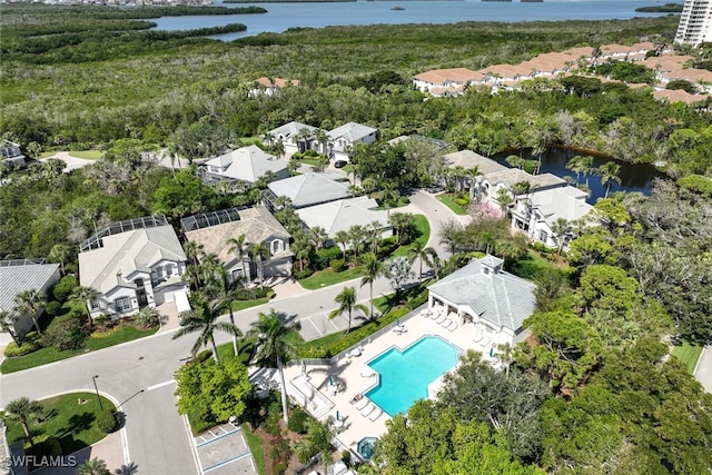 bird's eye view with a residential view and a water view