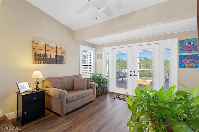 interior space with lofted ceiling, ceiling fan, wood finished floors, baseboards, and french doors