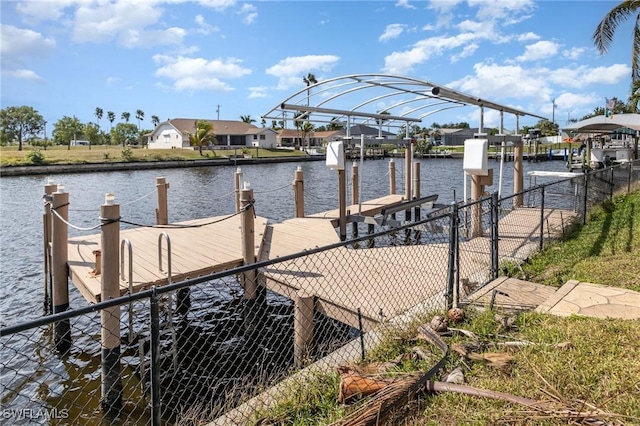 view of dock featuring a water view and boat lift