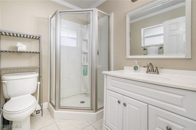 full bathroom featuring toilet, a shower stall, ornamental molding, and tile patterned floors