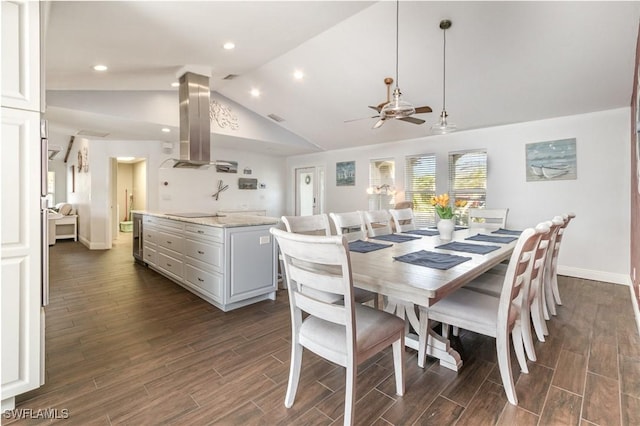 dining room featuring a ceiling fan, wood finish floors, visible vents, and baseboards