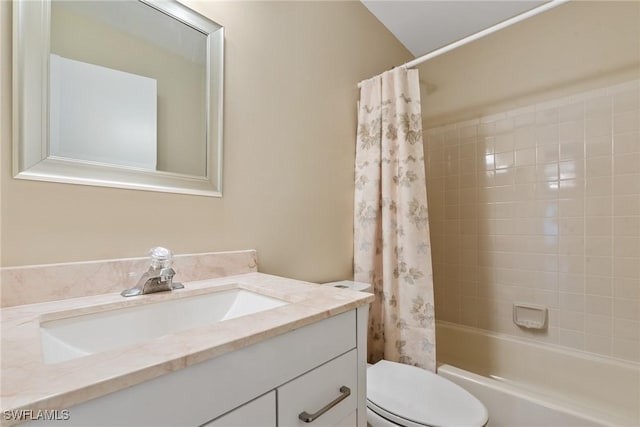 full bathroom with shower / bath combo with shower curtain, toilet, and vanity