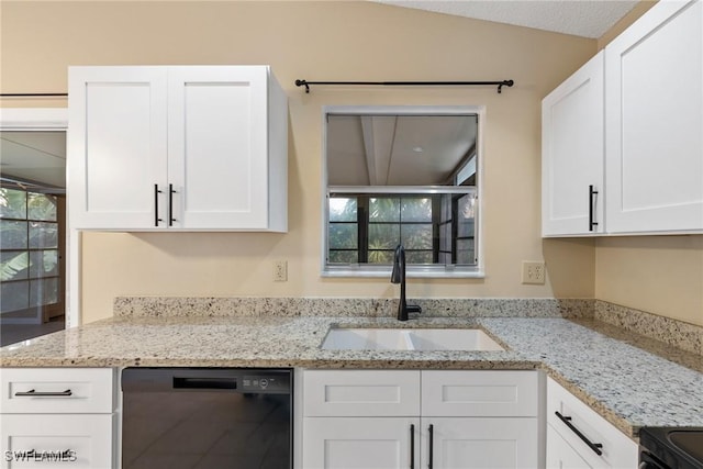 kitchen with dishwasher, light stone counters, white cabinetry, and a sink