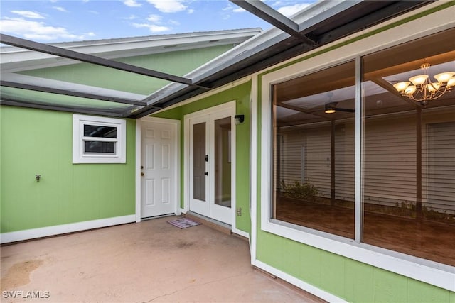 doorway to property featuring a patio area