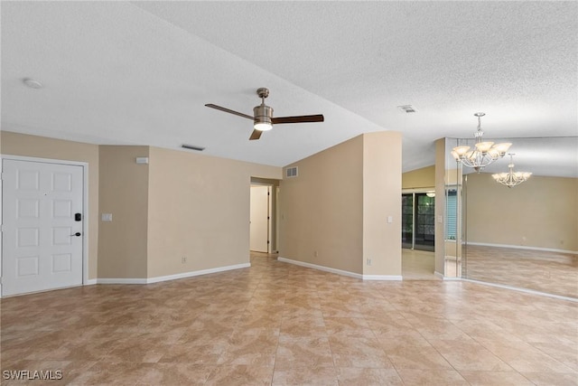 unfurnished living room featuring vaulted ceiling, ceiling fan with notable chandelier, and visible vents