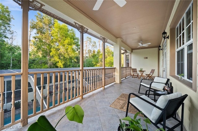 exterior space with a ceiling fan