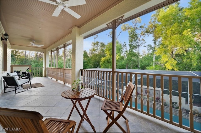 sunroom / solarium with ceiling fan