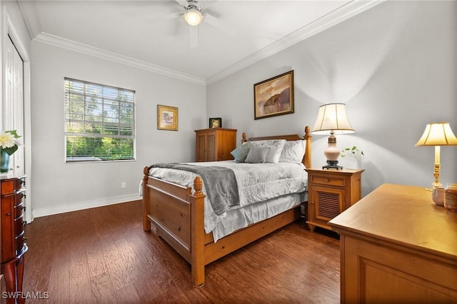 bedroom with ornamental molding, dark wood-style flooring, a ceiling fan, and baseboards