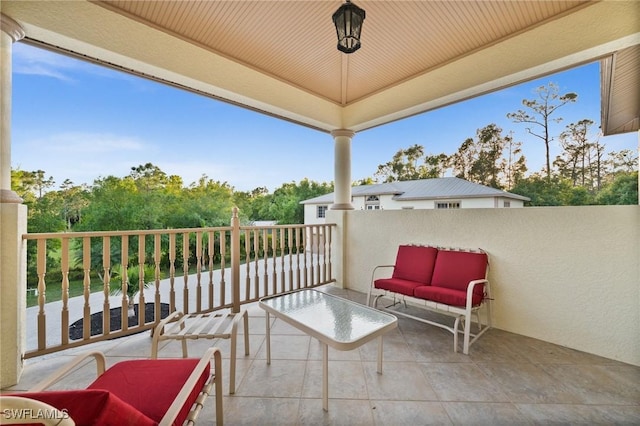 view of patio / terrace featuring a balcony