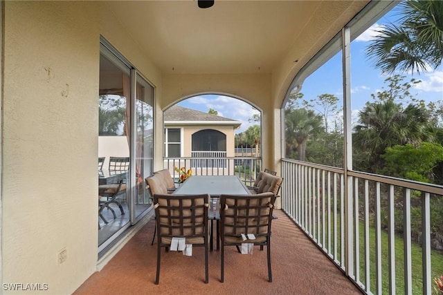 balcony featuring outdoor dining space