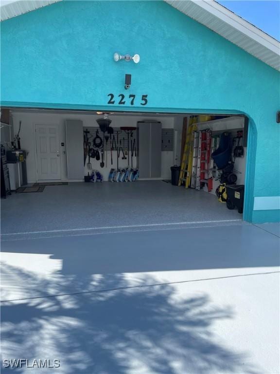 garage with driveway