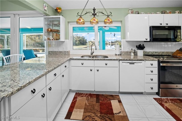 kitchen with black microwave, hanging light fixtures, white dishwasher, stainless steel electric stove, and white cabinetry