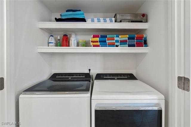 880 Huron Ct Unit 107, Marco Island, FL 34145 - laundry area featuring separate washer and dryer