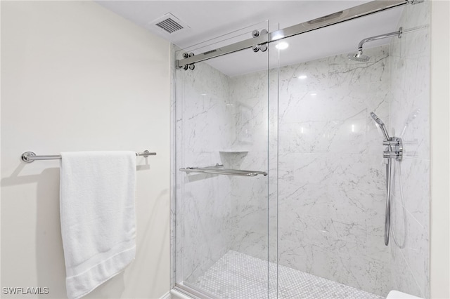 880 Huron Ct Unit 107, Marco Island, FL 34145 - bathroom with a marble finish shower