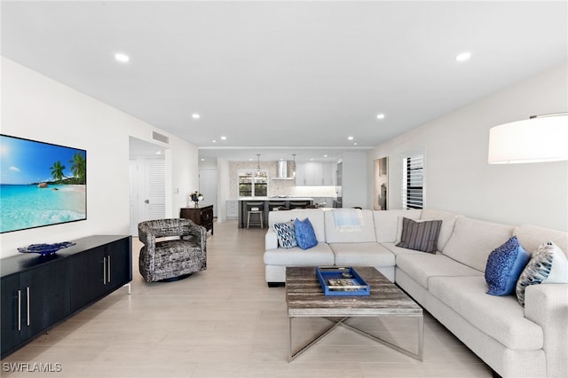 880 Huron Ct Unit 107, Marco Island, FL 34145 - living area with recessed lighting and light wood-style floors