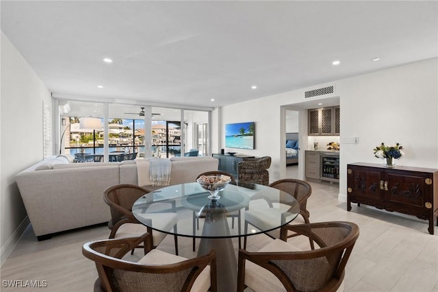 880 Huron Ct Unit 107, Marco Island, FL 34145 - dining space featuring recessed lighting and wine cooler