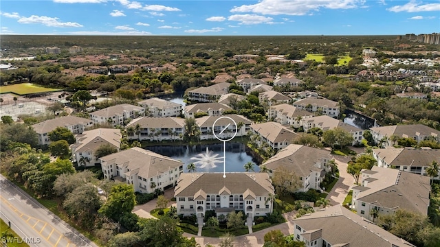 aerial view with a water view and a residential view