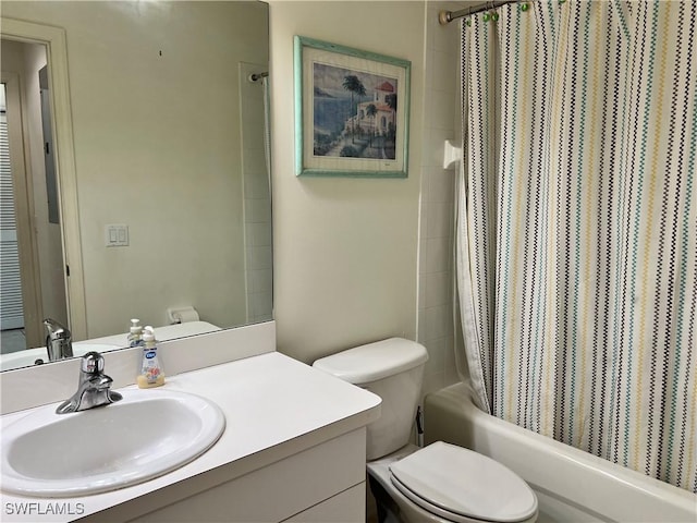 full bath with toilet, shower / tub combo with curtain, and vanity