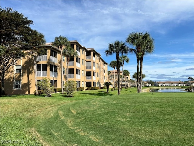 view of building exterior with a water view