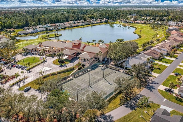 aerial view with a water view and a residential view