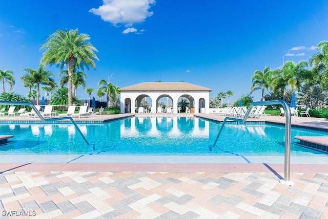 pool with a patio area