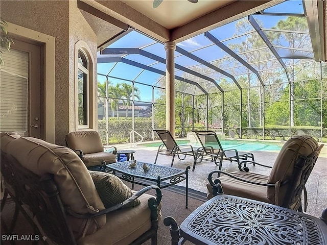 view of patio / terrace featuring glass enclosure, an outdoor living space, and an outdoor pool