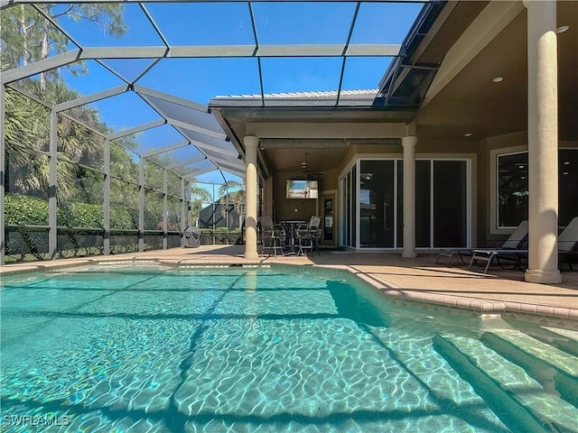 pool featuring a lanai and a patio