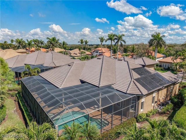 birds eye view of property with a residential view