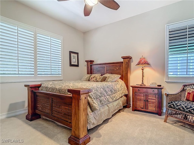 bedroom with ceiling fan and carpet flooring