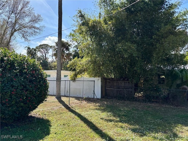 view of yard featuring fence