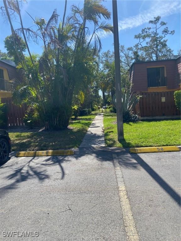 view of street with curbs