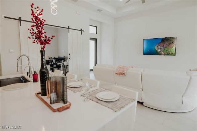 dining room with a barn door