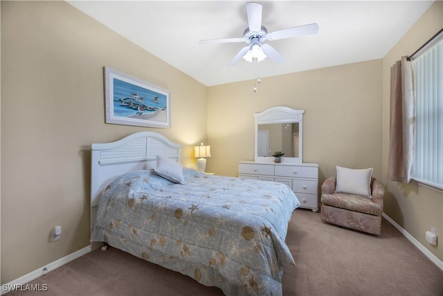 bedroom featuring carpet floors, baseboards, and a ceiling fan