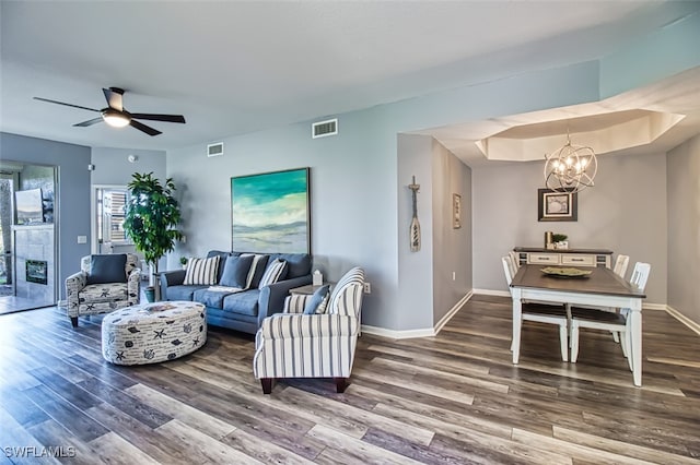 3111 Meandering Way Unit 101, Fort Myers, FL 33905 - living area featuring wood finished floors, a chandelier, ceiling fan, and baseboards