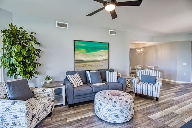 3111 Meandering Way Unit 101, Fort Myers, FL 33905 - living area featuring a chandelier, wood finished floors, and ceiling fan
