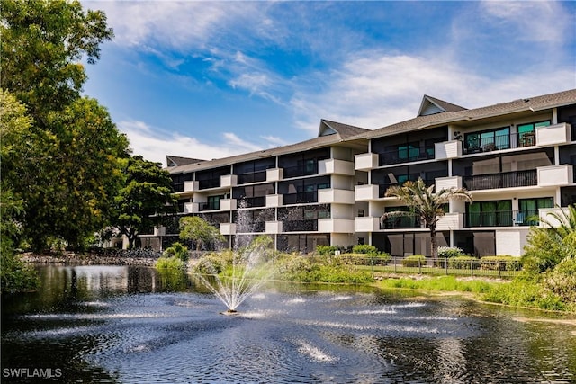 view of property with a water view